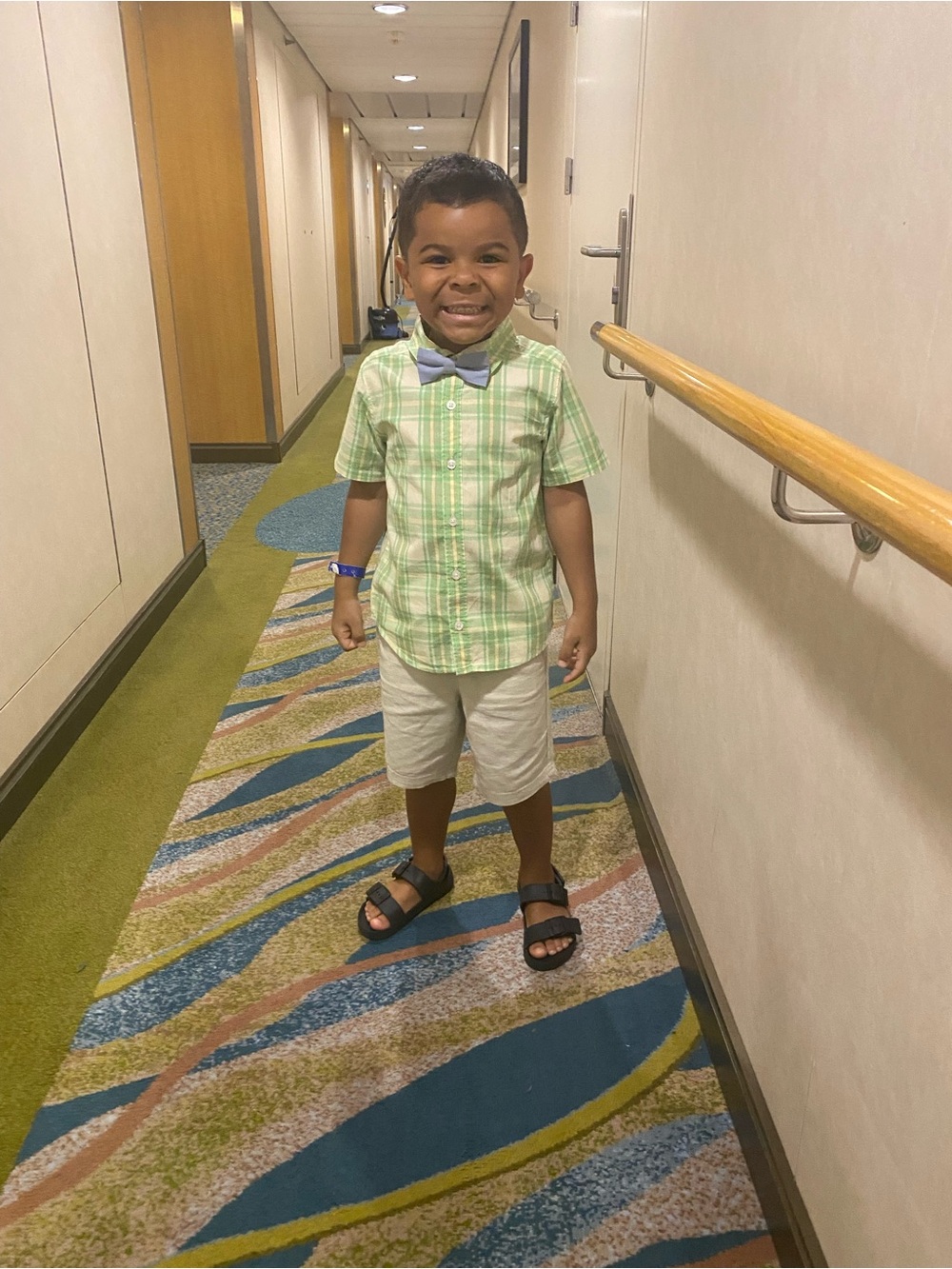 Old Navy Light Green Plaid Shirt with Cream Shorts and Blue Bow Tie